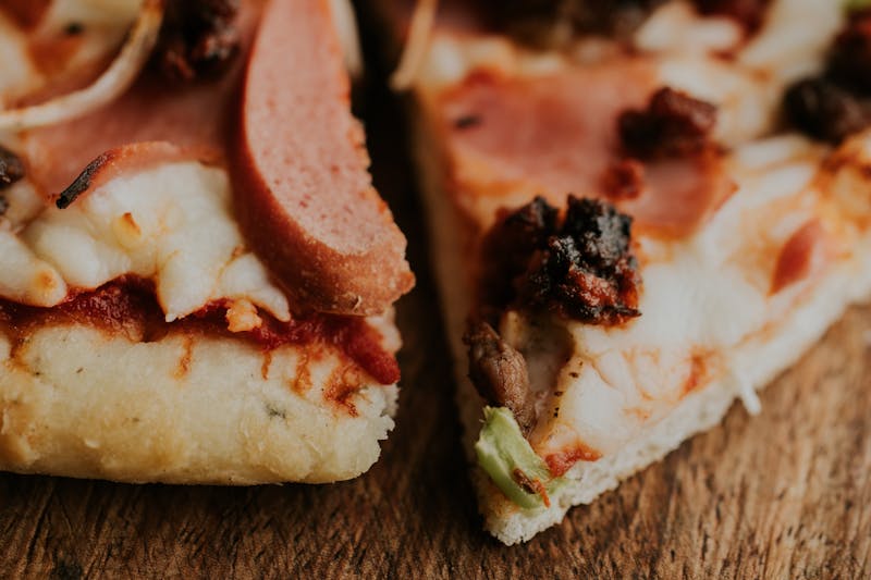 Guadalupe pizza with Italian sausage and roasted peppers